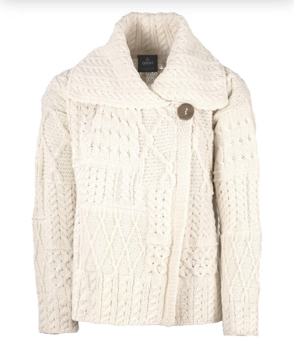 A white sweater with buttons on the front.