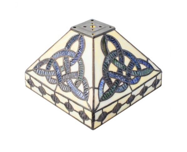A stained glass lamp shade with a celtic design.