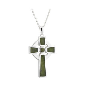 A cross is shown with green stones.