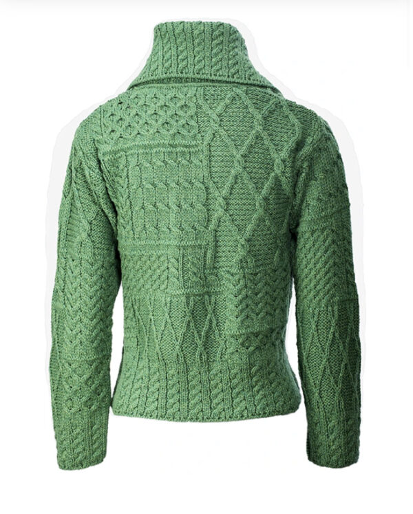 A green sweater with a pattern on it.