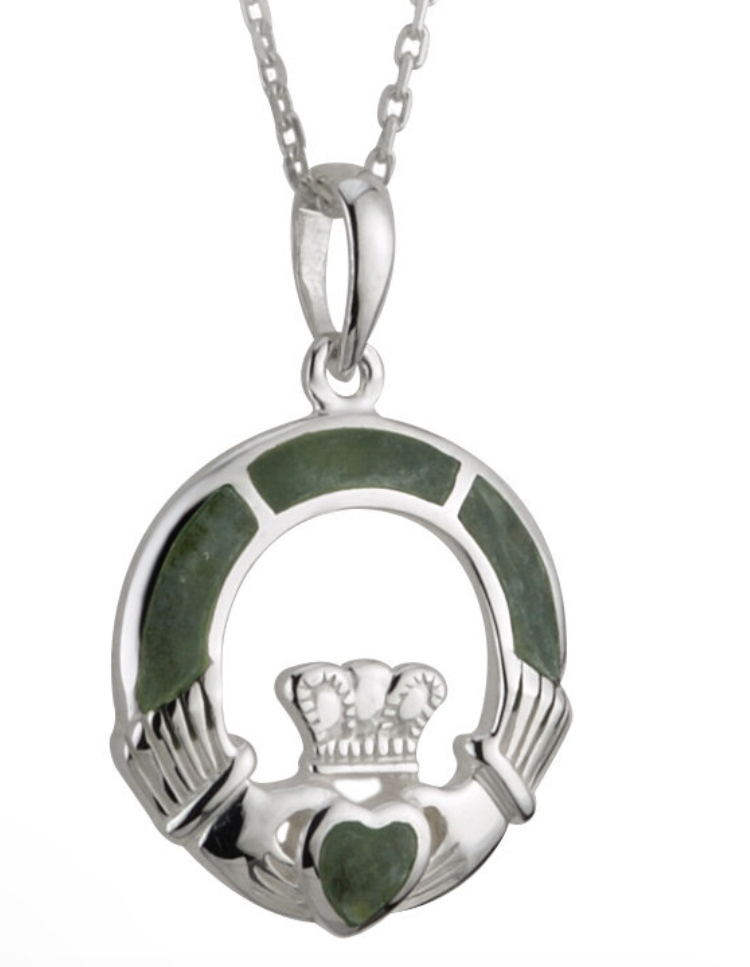 A silver claddagh necklace with green enamel.