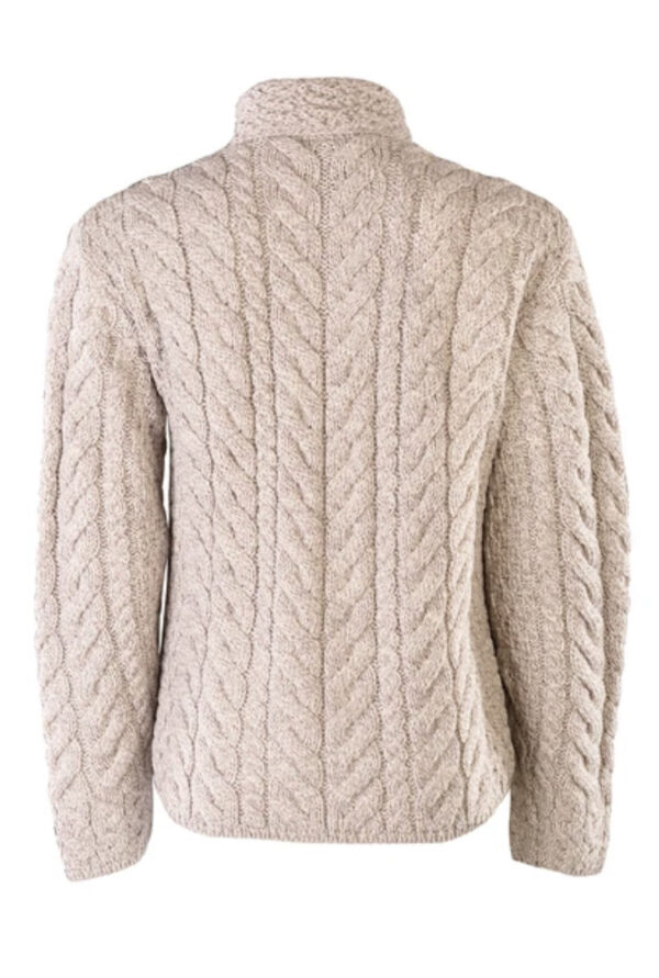 A beige sweater with a large cable knit pattern.