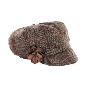 A brown hat with a flower on it.