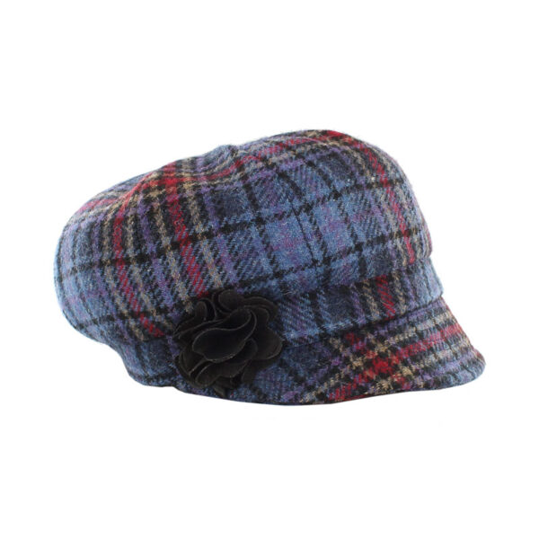 A blue plaid hat with a flower on the side.