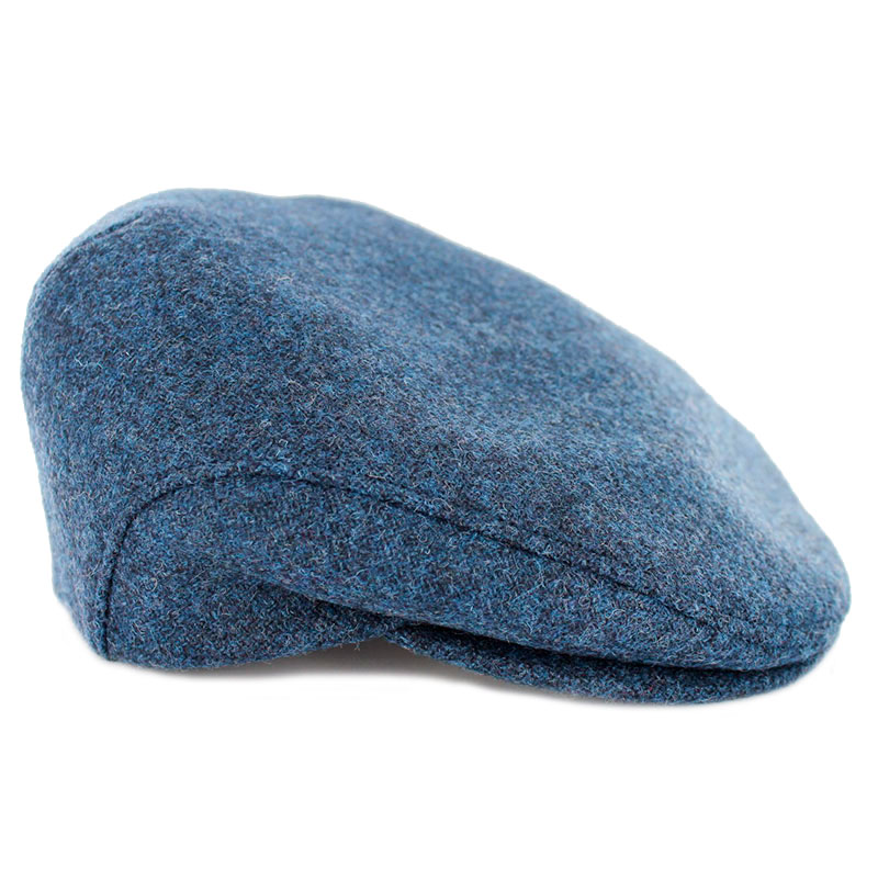 A blue hat is sitting on top of the floor.