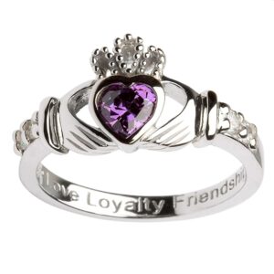 A claddagh ring with the words loyalty, friendship and loyalty engraved on it.