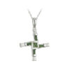 A cross shaped pendant with green stones on it.