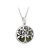 A silver necklace with a tree of life on it.