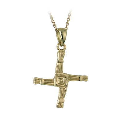 A gold cross with a chain hanging from it.