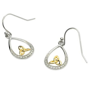 A pair of earrings with gold and diamond accents.