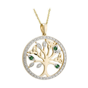 A gold necklace with a tree of life pendant.