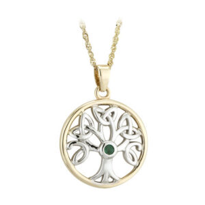 A gold and silver tree of life necklace with green stone.