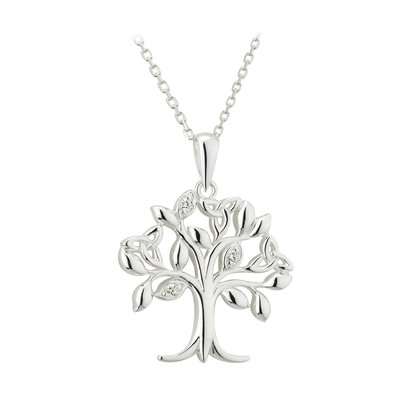 A silver tree necklace with diamonds on it.