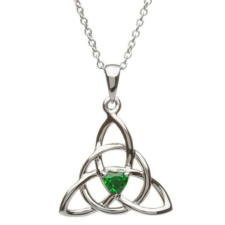 A silver necklace with a green stone in the center.