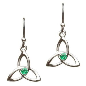 A pair of silver earrings with green stones.