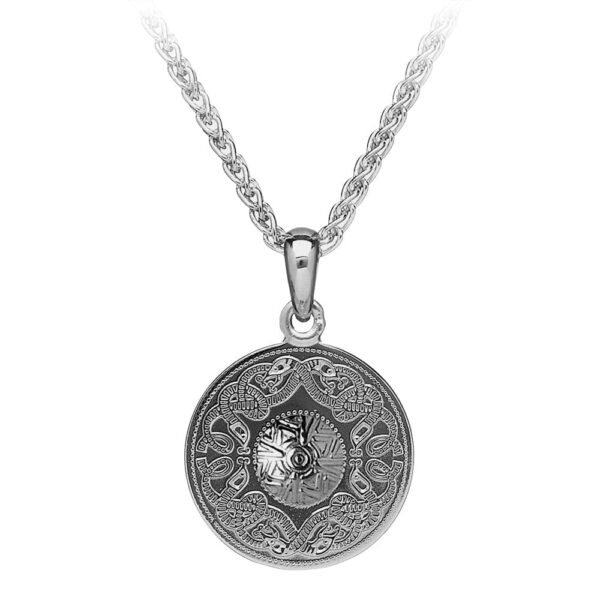 A silver necklace with a round pendant on it.
