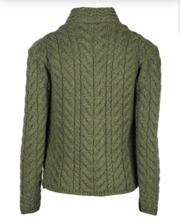 A green sweater with a large cable knit pattern.