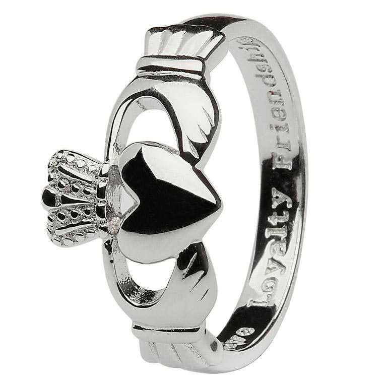 A claddagh ring with the name of " faith ".