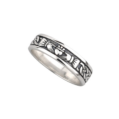 A silver ring with the claddagh symbol on it.