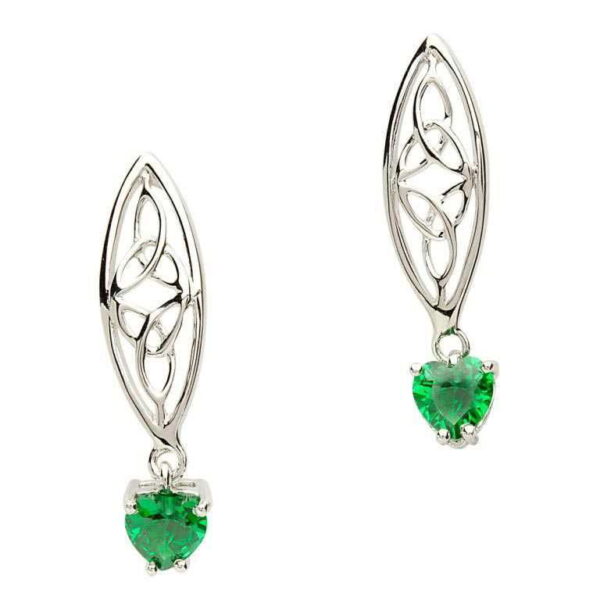 A pair of earrings with green stones on them.