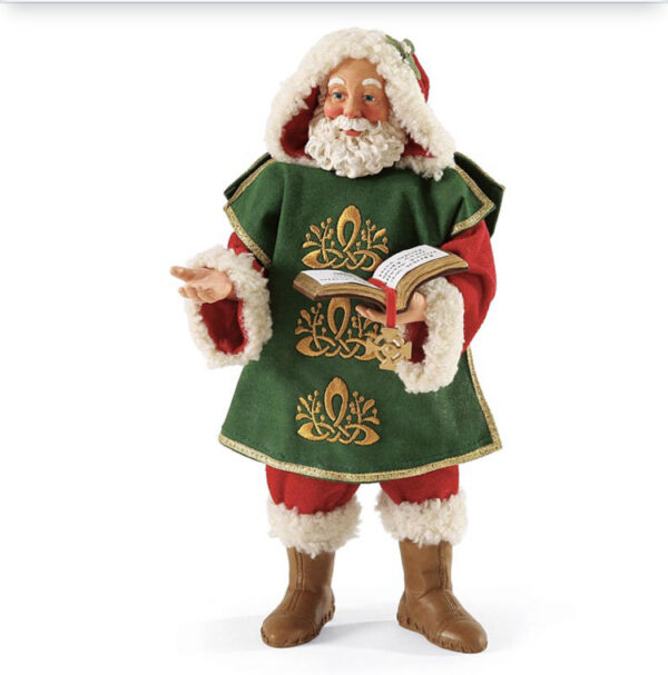 A santa clause figurine is dressed in green and red.
