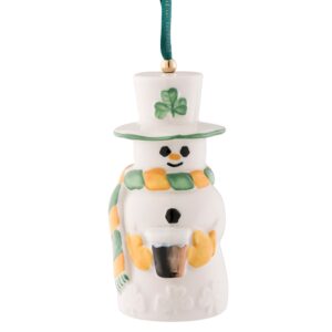 A snowman ornament with a shamrock on it.