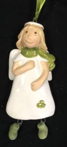 A ceramic angel with green scarf on it's chest.