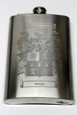 A metal flask with the name of murphy engraved on it.