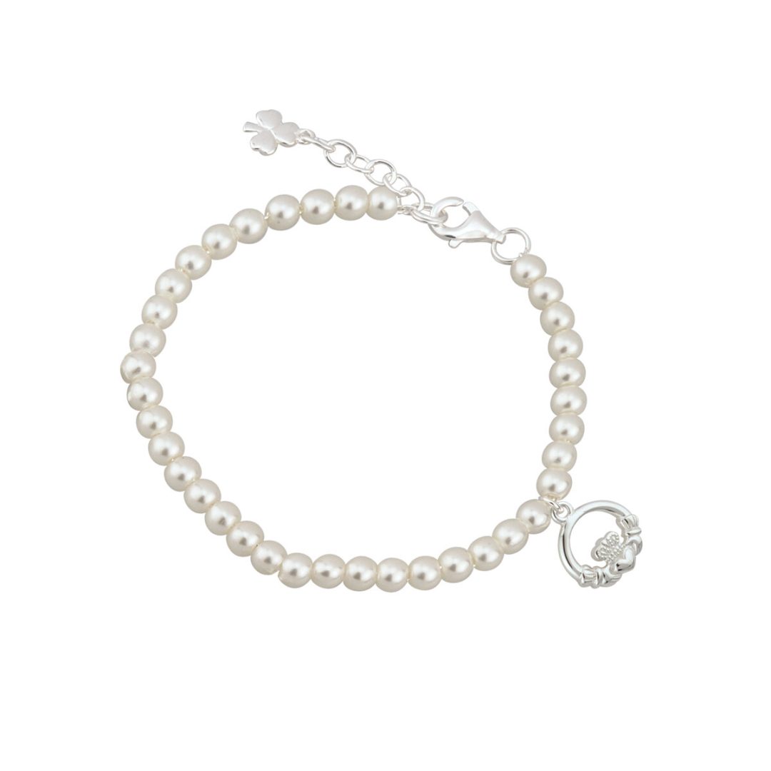 A bracelet with a small white flower charm on it.