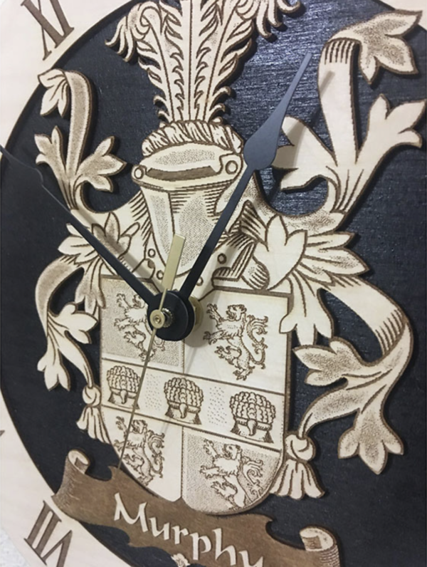 A clock with the arms of a family crest.