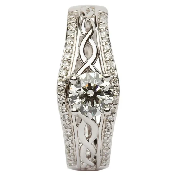 A diamond ring with a celtic design on the band.