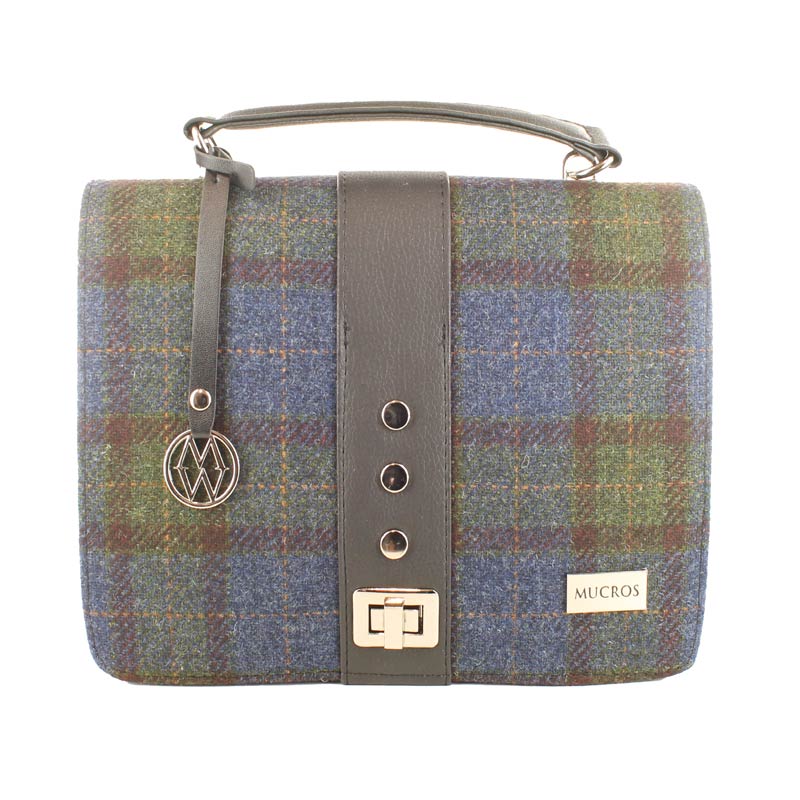 A bag that is made of wool and leather.
