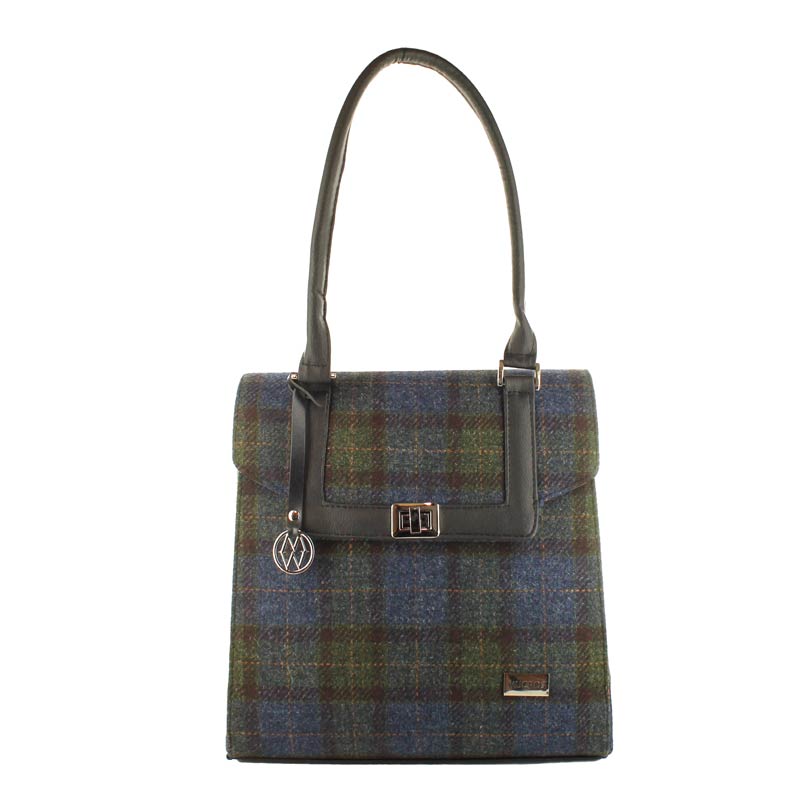 A plaid bag with a silver clasp and handle.
