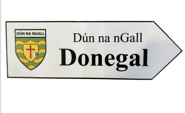 A white sign with the name of donegal on it.