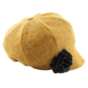 A hat with a flower on the side of it.