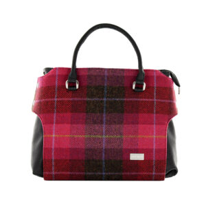 A red plaid bag with black leather handles.