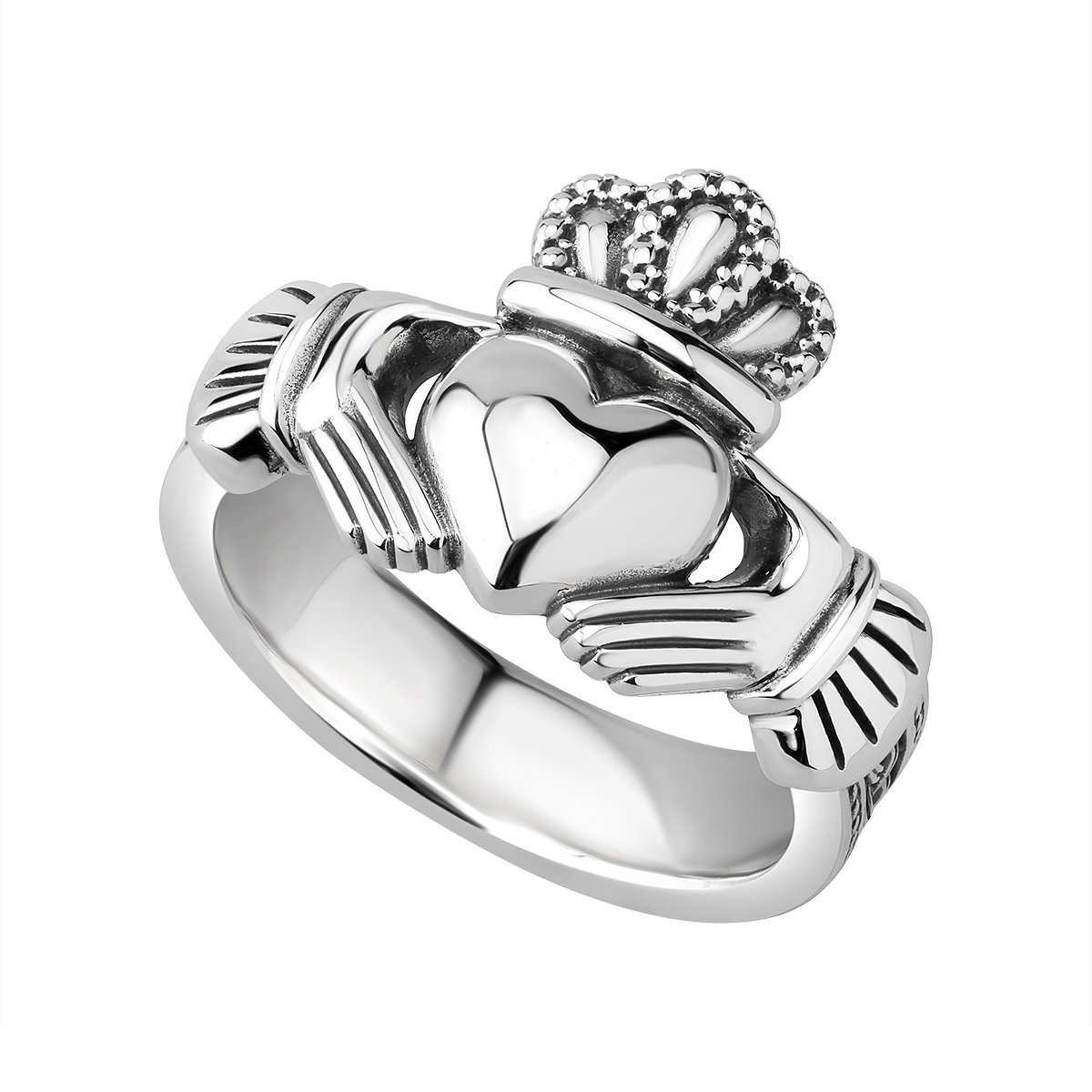 A silver claddagh ring with the crown on top of it.