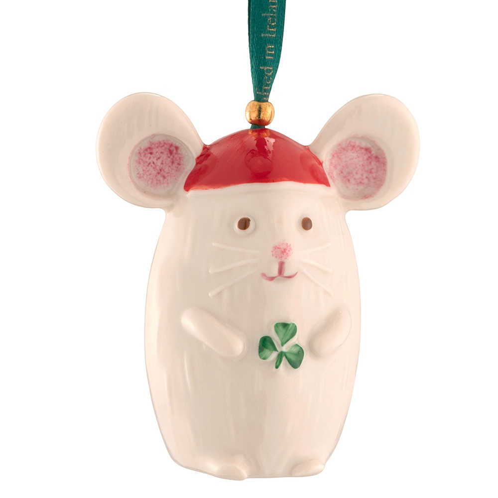 A white mouse with four leaf clover on its head.