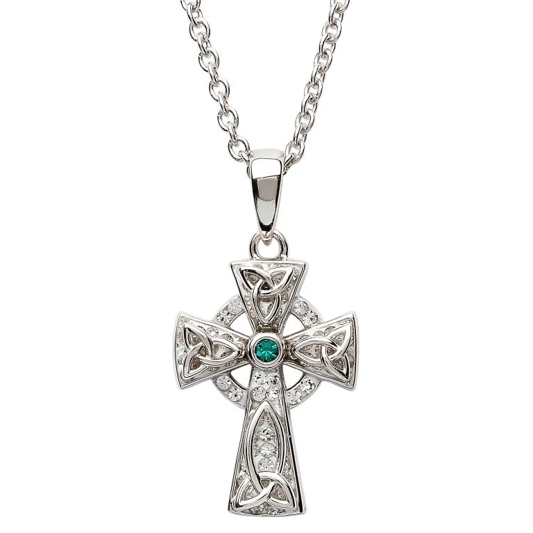 A cross with a green stone on it's side.