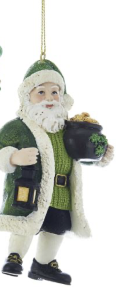 A santa clause figurine holding a pot of gold.