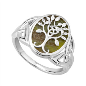 A silver ring with a tree of life on it.