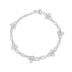 Silver bracelet with intricate knot design.