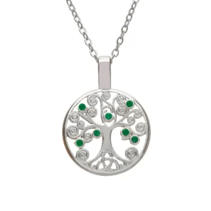 Silver tree pendant with green stones.
