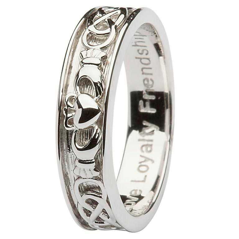 A silver ring with the words loyalty and friendship engraved on it.
