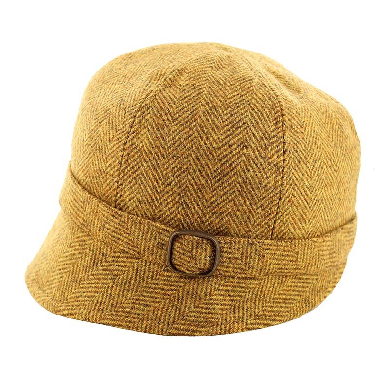 A brown hat with a buckle on the side.