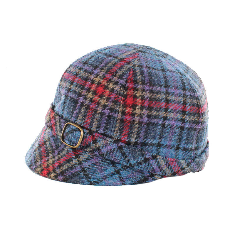 A blue plaid hat with a gold heart on the side.