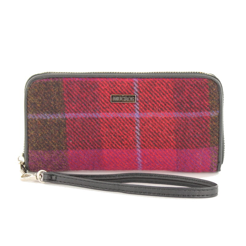 A red and brown plaid wallet with a gray strap.