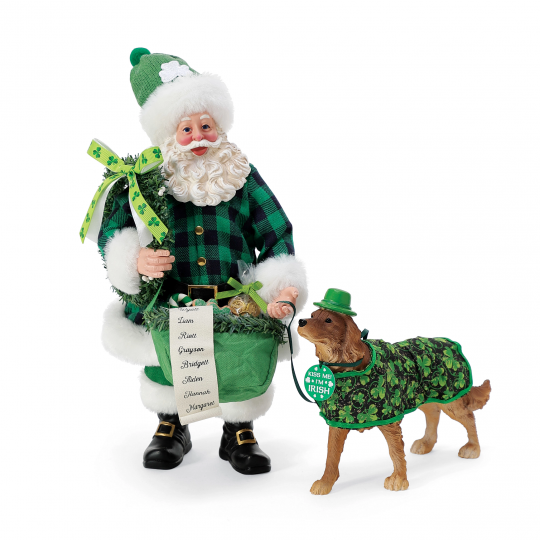 A man in green plaid shirt and hat with dog.
