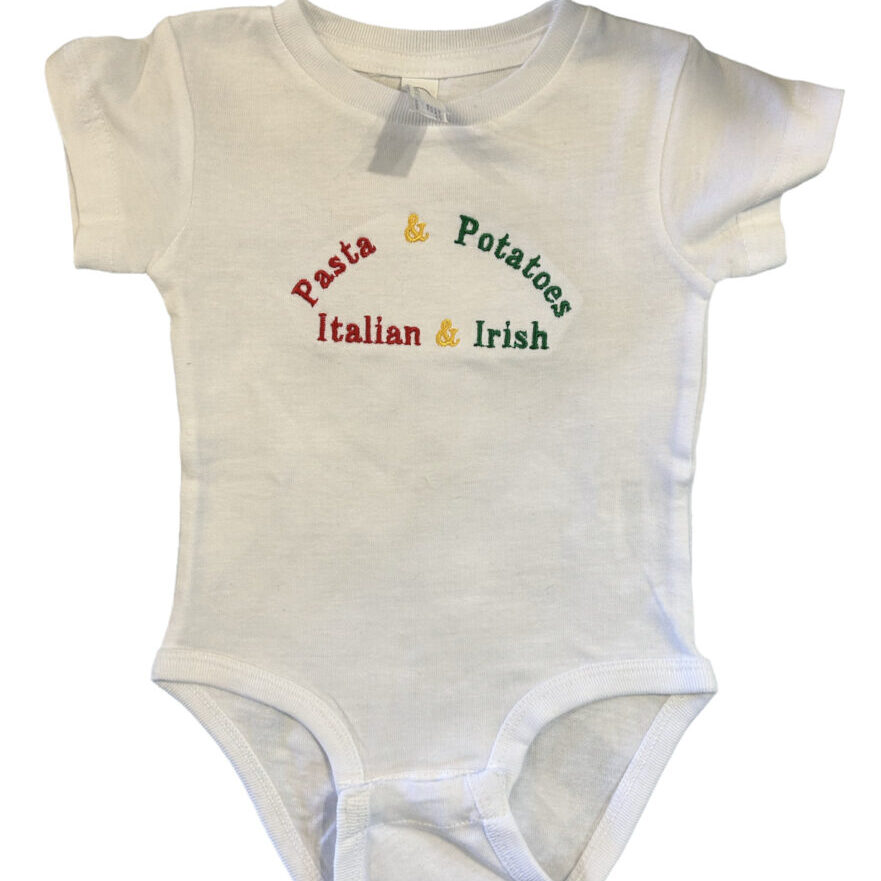 A white onesie with pasta and potatoes written on it.