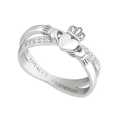 A claddagh ring with diamonds on it's side.